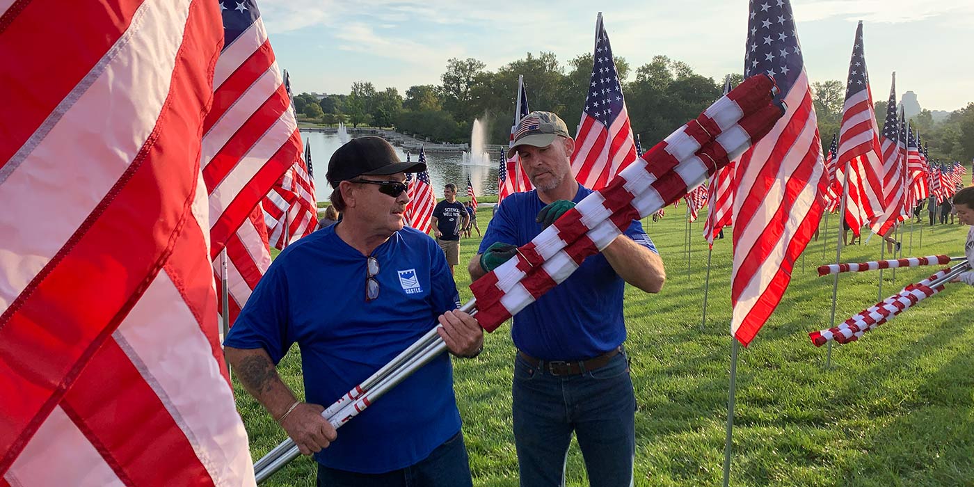 two men american flags