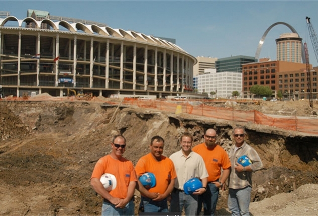 The Castle team in front of Busch Stadium construction.