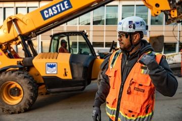 Man at Castle jobsite with equipment
