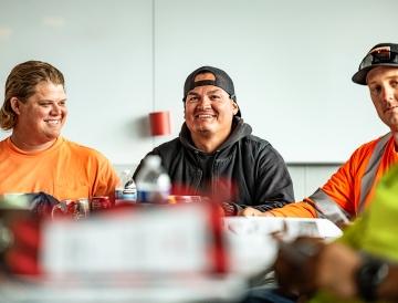 people laughing in a meeting