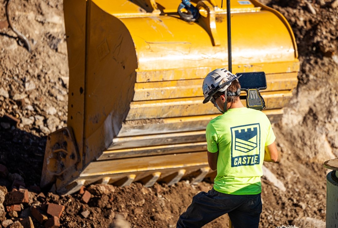 person working with excavator
