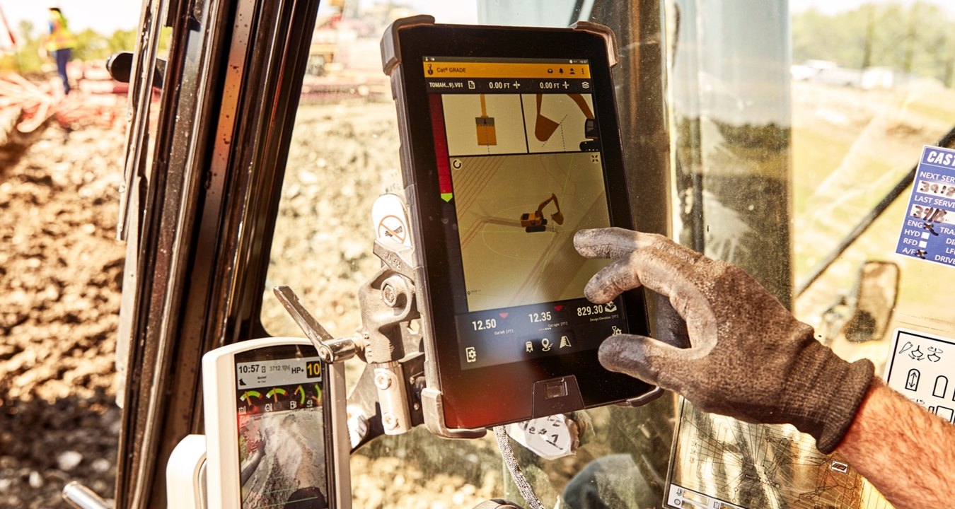construction person working on his ipad