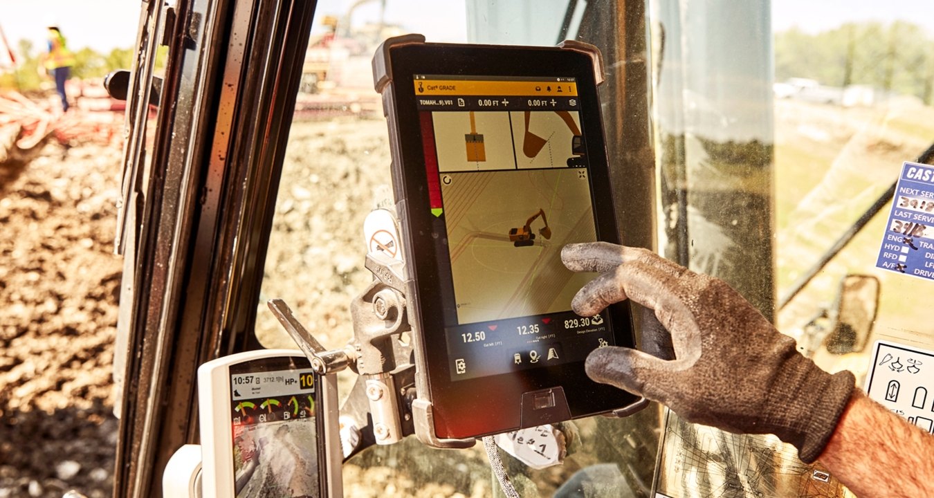 construction worker on a jobsite working on an ipad