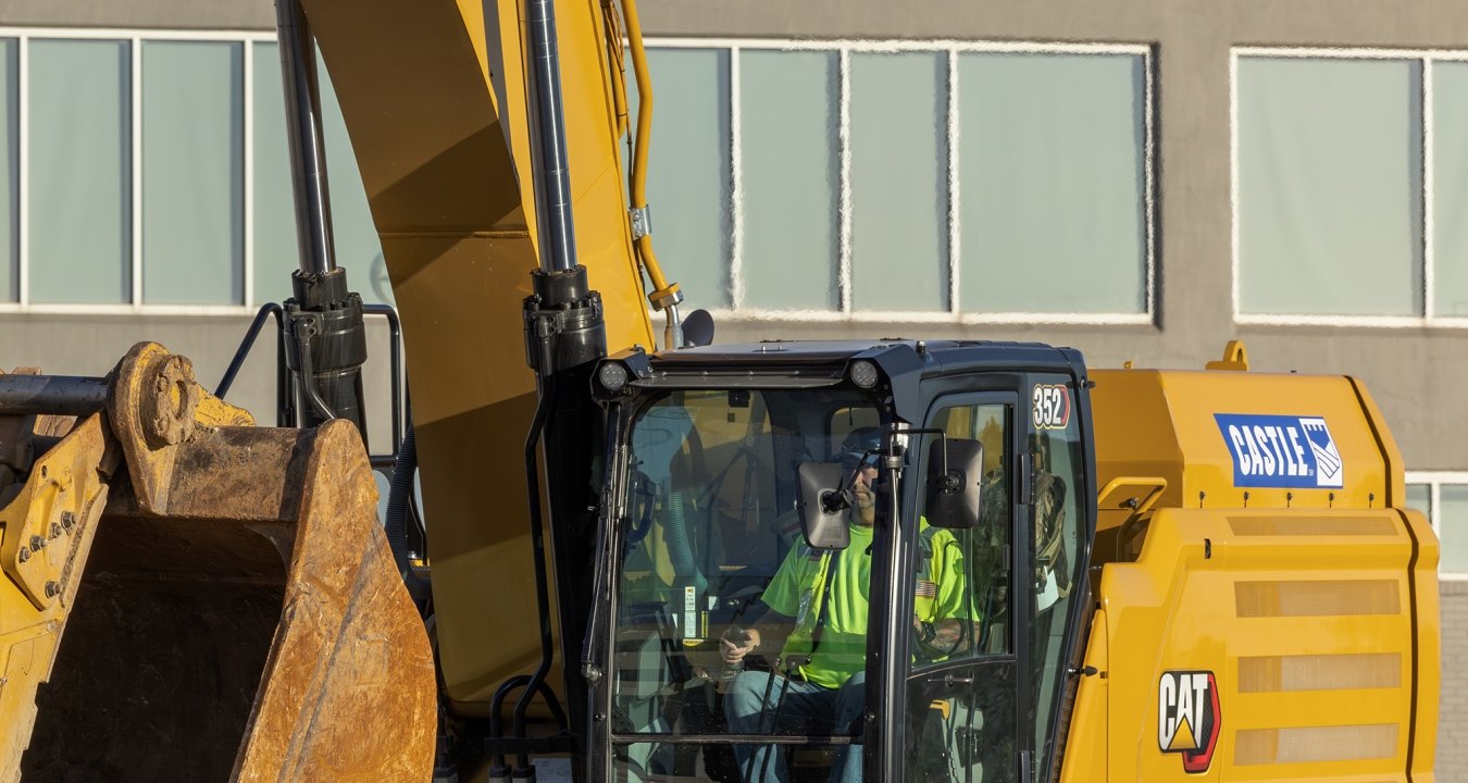 A person operating a piece of equipment