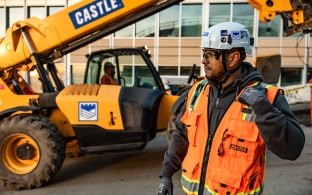 Man at Castle jobsite with equipment