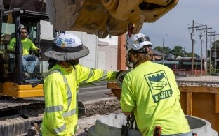 people work on quality with equipment