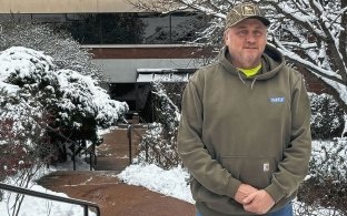 Billy Barton stands in front of Castle Contracting office