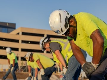castle team stretching on a jobsite