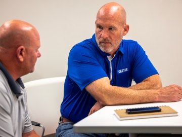 Two men talking