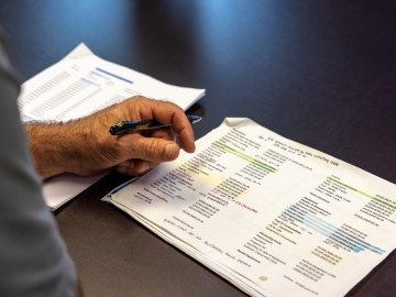 person reviewing paperwork