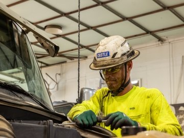 A person working on a piece of equipment