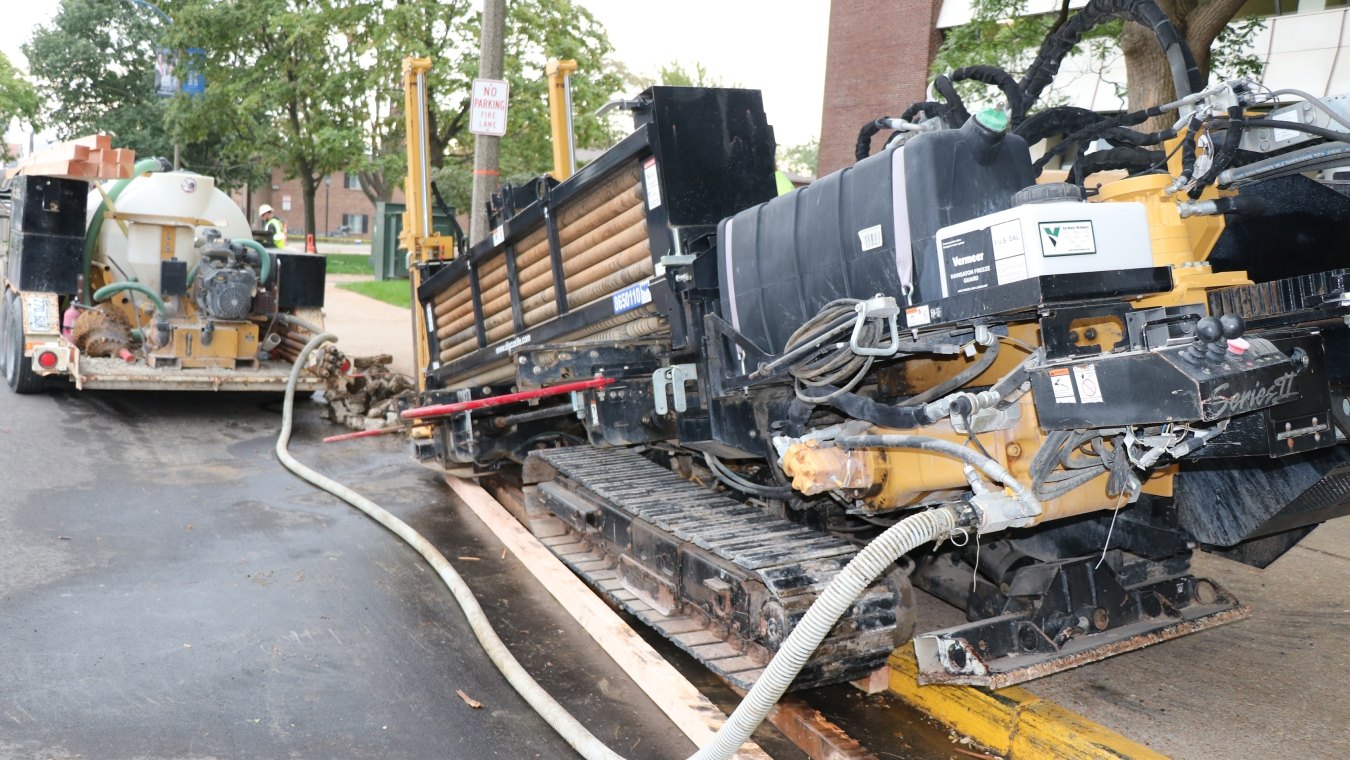 Directional boring along road and walkway