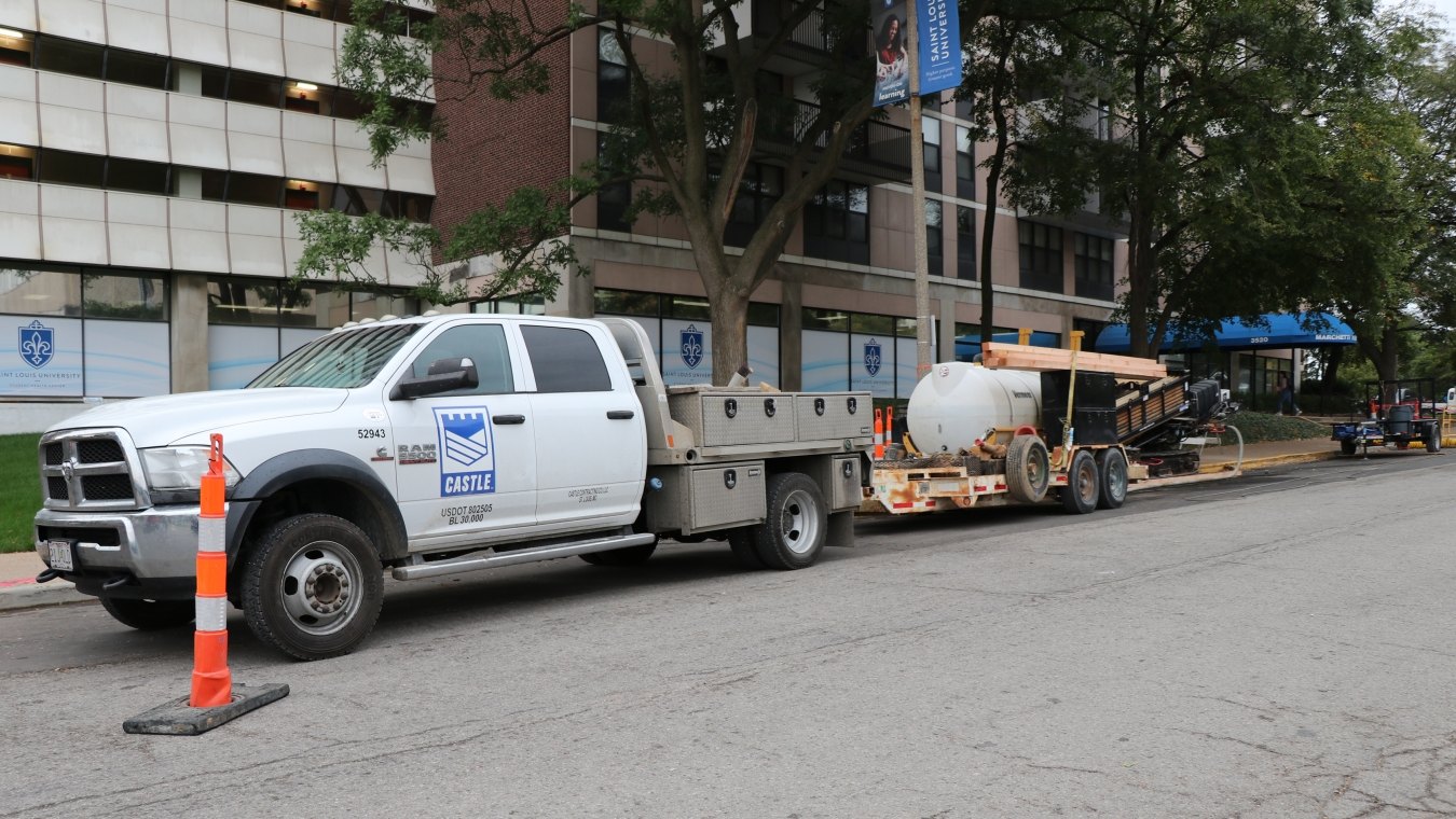 Castle Contracting work truck and trailer hitch with directional boring machinery