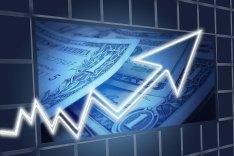chart showing money and an arrow pointing upwards