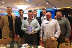group of castle people accepting an award