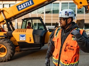 Man at Castle jobsite with equipment