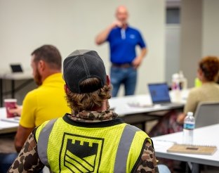 people in a training class
