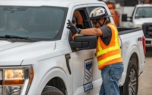 person directing a castle truck