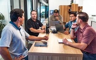 People collaborating around a table