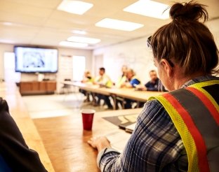 person in a group meeting