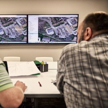 two people in the office collaborating