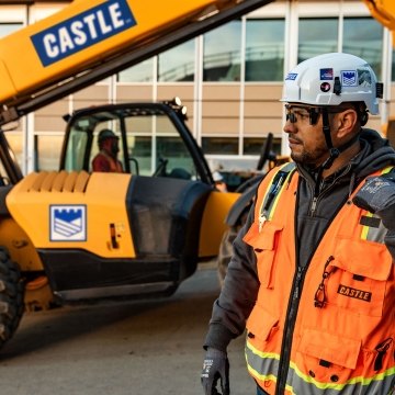 Man at Castle jobsite with equipment