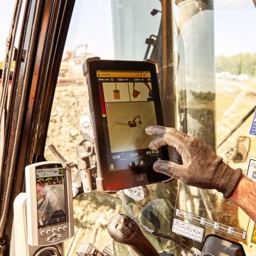 construction person working on his ipad