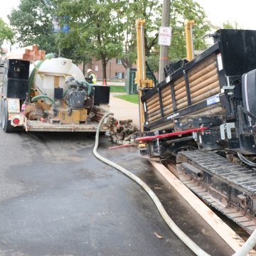 Directional boring along road and walkway