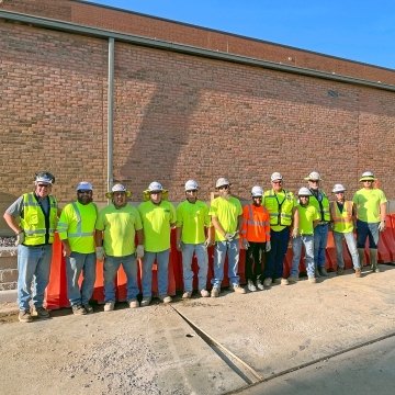 Construction worker project team group photo
