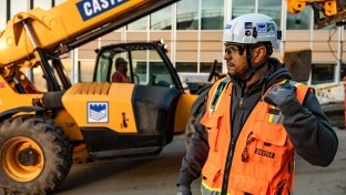 Man at Castle jobsite with equipment